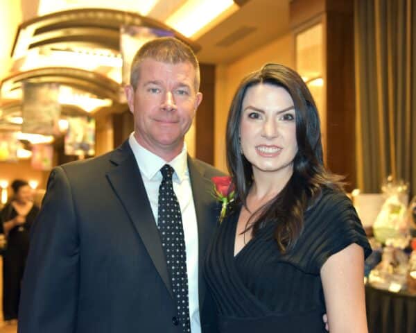 A smartly dressed couple at the annual United Services fundraising gala