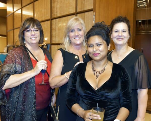 A group of smartly dressed women at the annual United Services fundraising gala